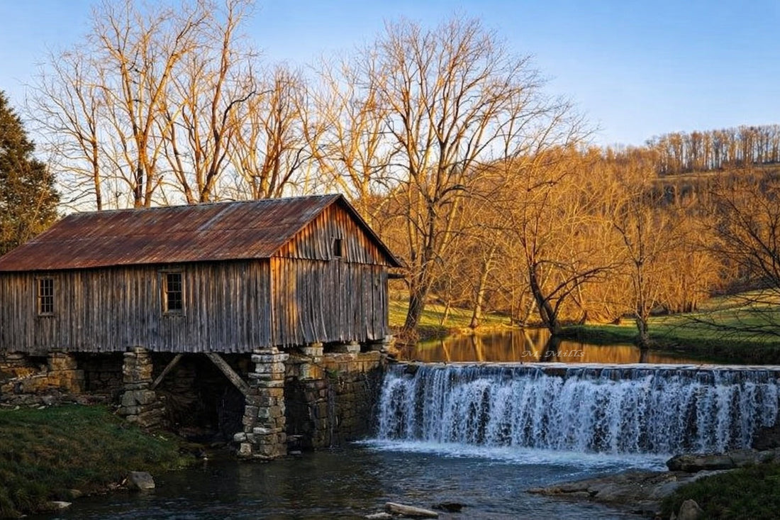 1890 Cowan Gristmill on Route 698 near Ewing Virginia with waterfall and rustic wooden structure