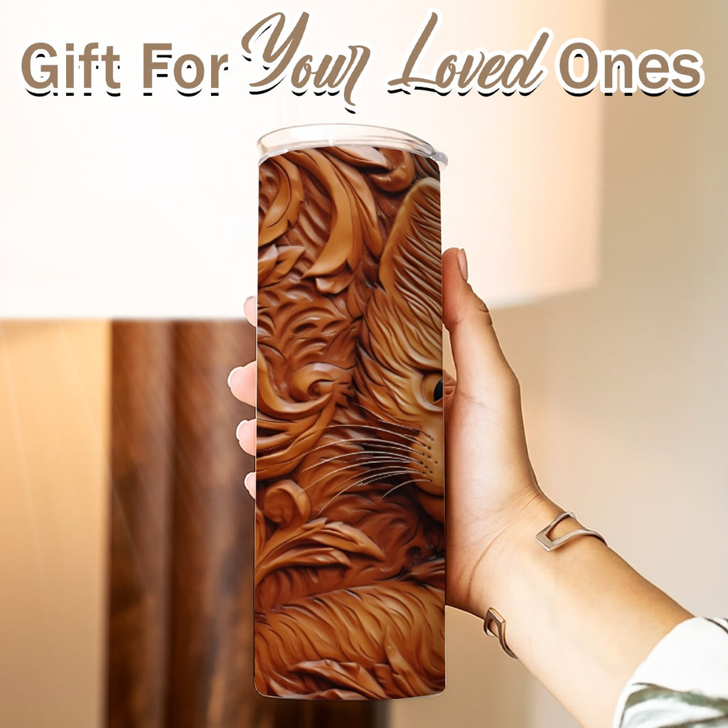 Hand holding a 20 oz straight tumbler with tooled leather kitten design
Gift For Your Loved Ones on a blurred background.