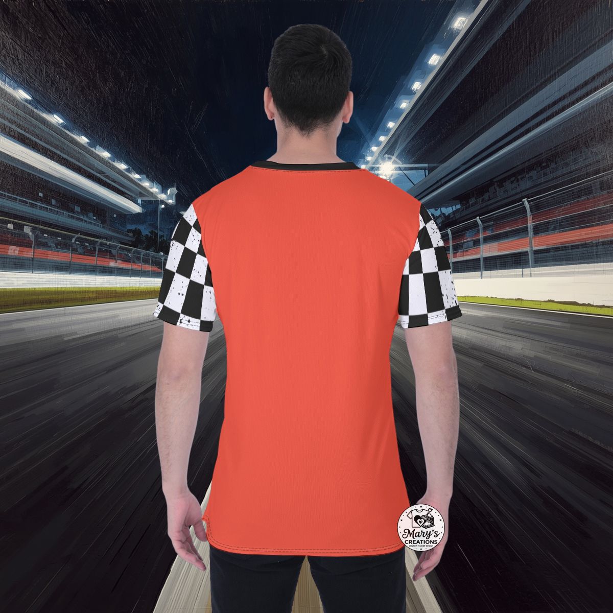 Person wearing an '97 Camaro Z28 High-Performance AOP Racing Tee | Mary's Creations - in a racetrack setting