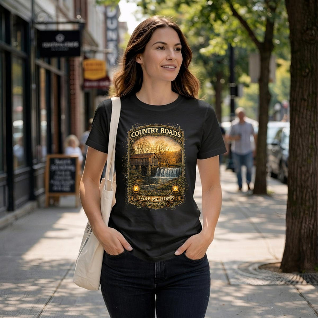 Women wearing a black t-shirt of a vintage graphic-Country Roads-Take Me Home Shirt.