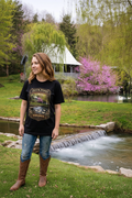 Woman wearing Duck Pond Pennington Gap Virginia black graphic tee outdoors.