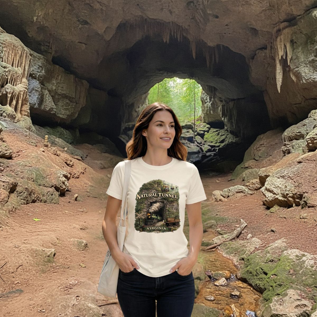 Close-up of a woman by a cave wearing a vintage shirt showing a steam train emerging from the tunnel.