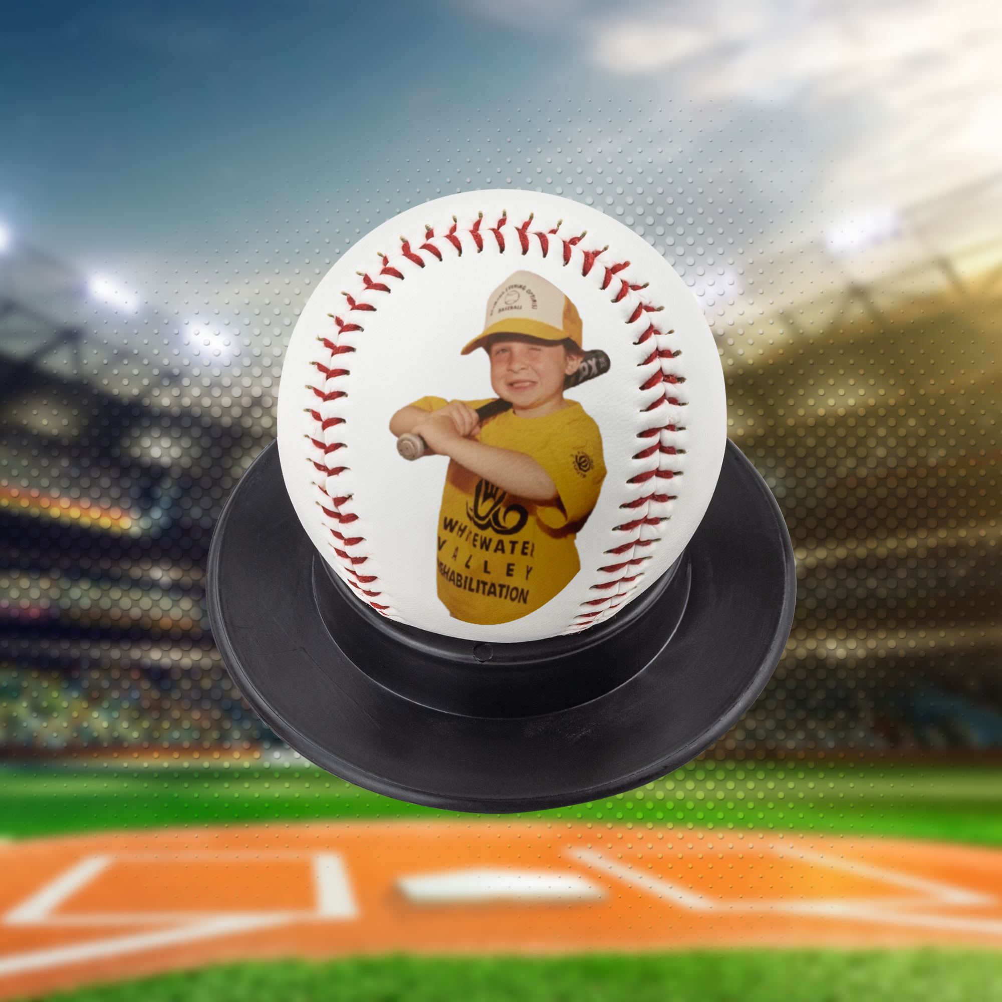 Custom photo baseball on black display stand with baseball stadium background.