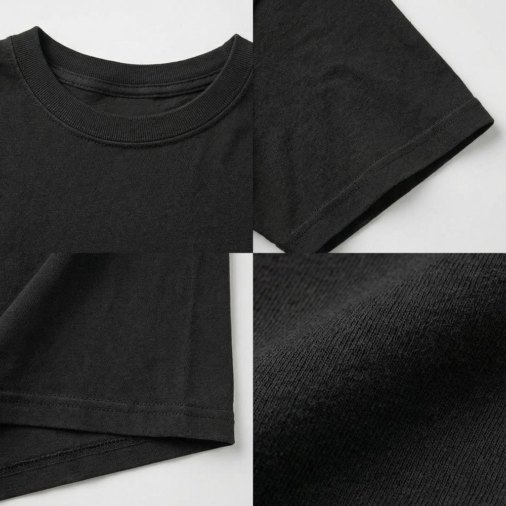 Close-up of a black t-shirt with details on fabric texture and stitching.