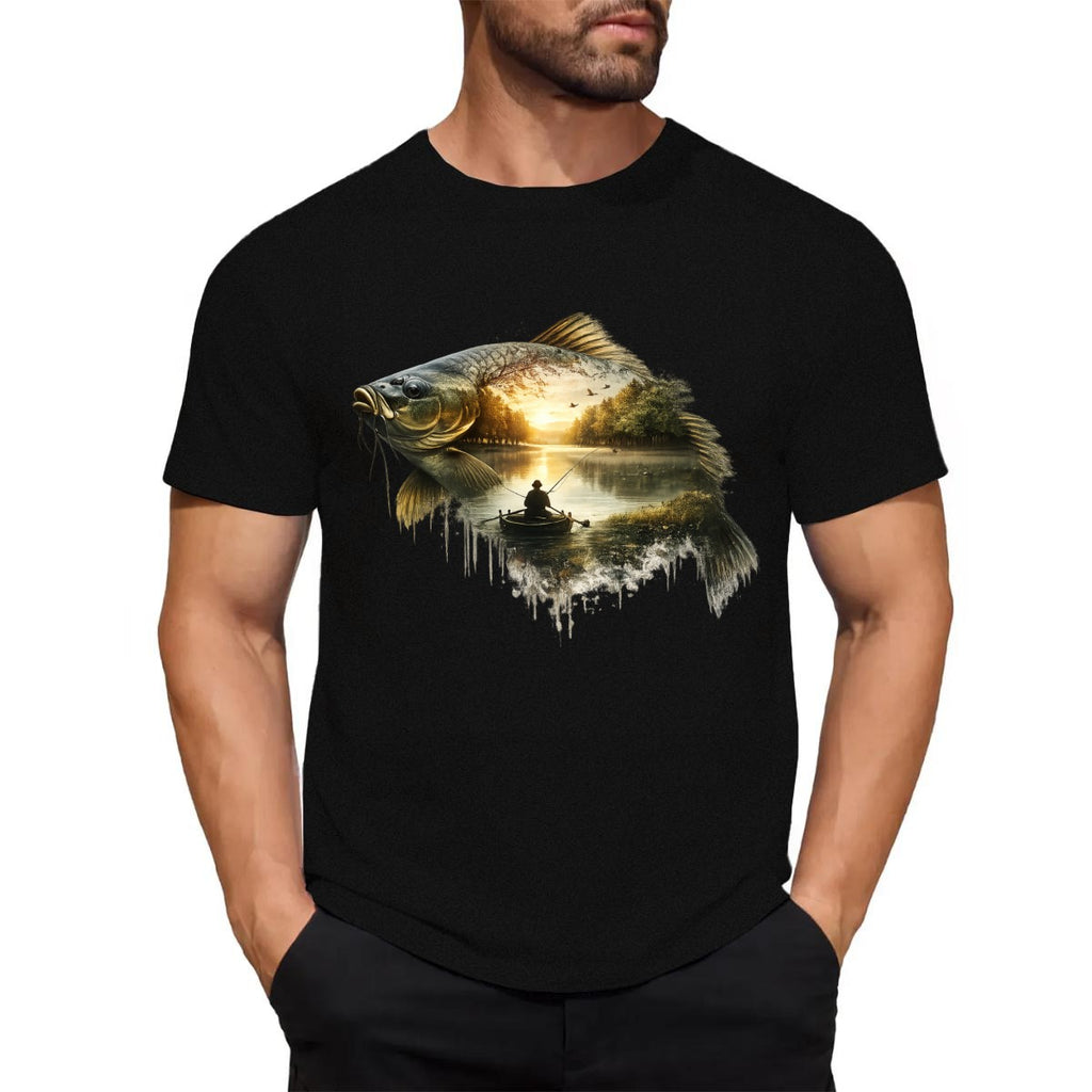 Black t-shirt with a fish and sunset design worn by a person on a white background.