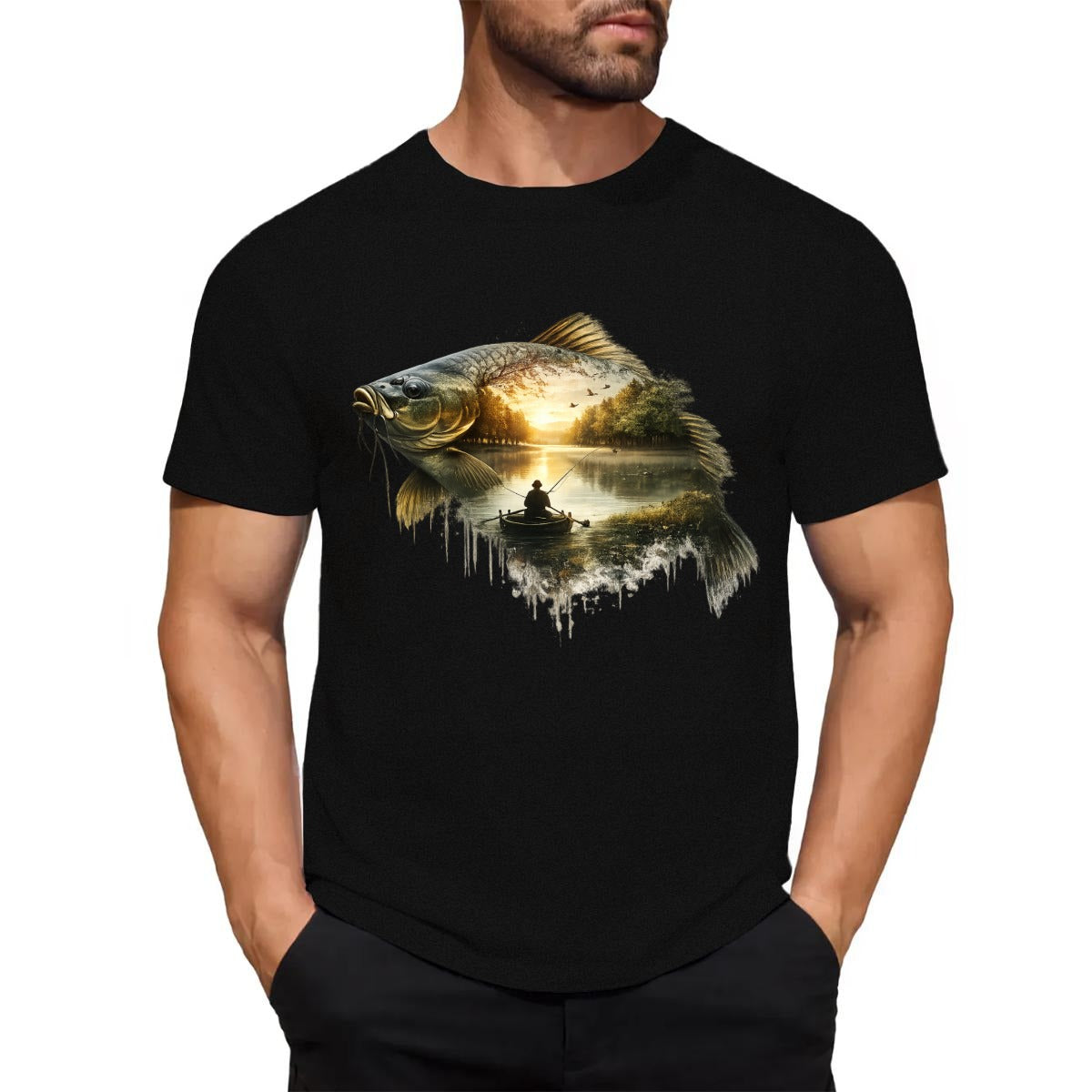 Black t-shirt with a fish and sunset design worn by a person on a white background.